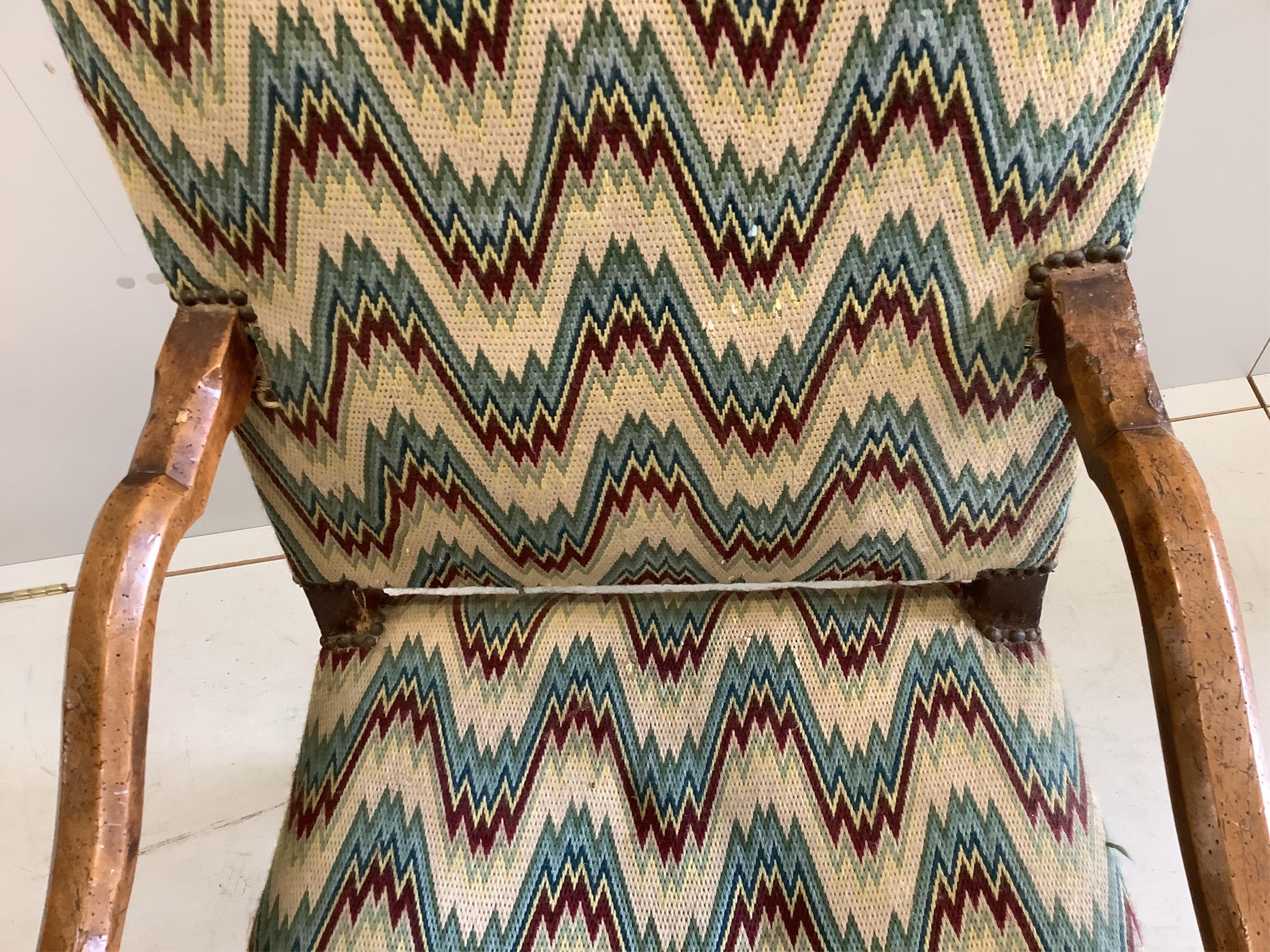 A 19th century French walnut armchair, in the 17th century style, width 64cm, height 116cm. Condition - heavily wormed, frame wobbling